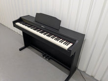 Load image into Gallery viewer, Roland RP102 digital piano in satin black finish stock number 25333