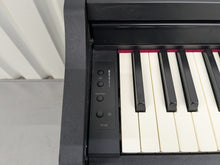 Load image into Gallery viewer, Roland RP102 digital piano in satin black finish stock number 25333