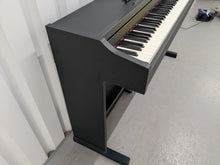 Load image into Gallery viewer, Roland RP102 digital piano in satin black finish stock number 25333