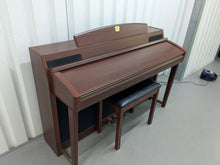 Load image into Gallery viewer, YAMAHA CLAVINOVA CLP-270 DIGITAL PIANO AND STOOL IN MAHOGANY FINISH stock #25332