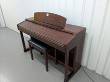 Load image into Gallery viewer, Yamaha Clavinova CLP-150 digital piano and stool in mahogany stock #25337