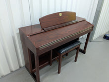 Load image into Gallery viewer, Yamaha Clavinova CLP-150 digital piano and stool in mahogany stock #25337