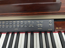Load image into Gallery viewer, Yamaha Clavinova CLP-150 digital piano and stool in mahogany stock #25337