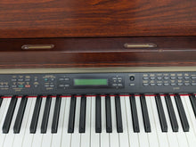 Load image into Gallery viewer, Yamaha Clavinova CLP-150 digital piano and stool in mahogany stock #25337