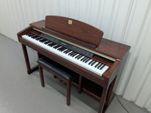Load image into Gallery viewer, Yamaha Clavinova CLP-150 digital piano and stool in mahogany stock #25337