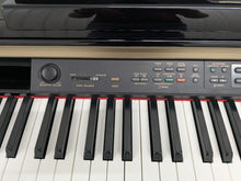 Load image into Gallery viewer, Yamaha Clavinova CLP-170PE Digital Piano glossy black polished ebony stock #25339