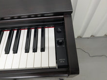 Load image into Gallery viewer, Yamaha Arius YDP-143 Digital Piano and stool in dark rosewood stock #25345