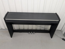 Load image into Gallery viewer, Roland F110 compact slim size Digital Piano in black  stock # 25364