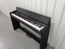 Load image into Gallery viewer, Roland F110 compact slim size Digital Piano in black  stock # 25364