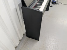 Load image into Gallery viewer, Roland F110 compact slim size Digital Piano in black  stock # 25364