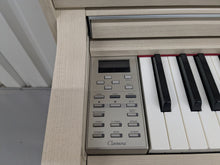 Load image into Gallery viewer, Yamaha Clavinova CLP-535 in white ash with matching stool stock nr 25373
