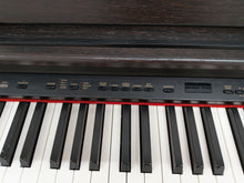 Load image into Gallery viewer, Yamaha Arius YDP-121 Digital Piano and stool in dark rosewood stock nr 25387