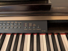 Load image into Gallery viewer, Yamaha Clavinova CLP-130 Digital Piano and stool in dark rosewood stock #25384