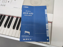 Load image into Gallery viewer, Yamaha DGX-650 in white 88 Weighted Keys Portable Grand 3 pedals stock #25393