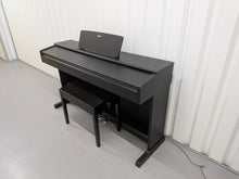 Load image into Gallery viewer, Yamaha Arius YDP-144 digital piano and stool in satin black stock nr 25401
