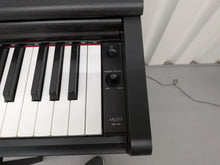 Load image into Gallery viewer, Yamaha Arius YDP-144 digital piano and stool in satin black stock nr 25401