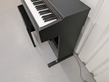 Load image into Gallery viewer, Yamaha Arius YDP-144 digital piano and stool in satin black stock nr 25401