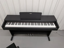 Load image into Gallery viewer, Yamaha Arius YDP-144 digital piano and stool in satin black stock nr 25401