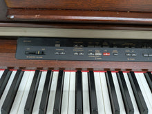 Load image into Gallery viewer, Yamaha Clavinova CLP-970 Digital Piano and stool in mahogany stock nr 25385