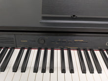 Load image into Gallery viewer, Casio Celviano AP-260 digital piano in satin black finish stock #25397