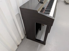 Load image into Gallery viewer, Yamaha Clavinova CLP-150 digital piano and stool in dark rosewood stock #25409