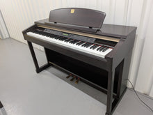Load image into Gallery viewer, Yamaha Clavinova CLP-150 digital piano and stool in dark rosewood stock #25409
