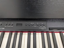 Load image into Gallery viewer, Roland F130R compact slim size Digital Piano and stool in black  stock # 25413