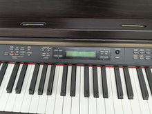 Load image into Gallery viewer, YAMAHA CLAVINOVA CLP-270 DIGITAL PIANO AND STOOL IN DARK ROSEWOOD stock nr 25425