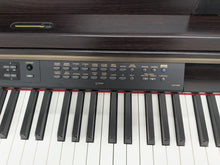 Load image into Gallery viewer, YAMAHA CLAVINOVA CLP-270 DIGITAL PIANO AND STOOL IN DARK ROSEWOOD stock nr 25425