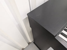 Load image into Gallery viewer, Yamaha Arius YDP-142 Digital Piano in satin black stock #25429
