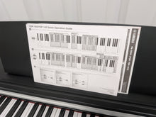 Load image into Gallery viewer, Yamaha Arius YDP-142 Digital Piano in satin black stock #25429