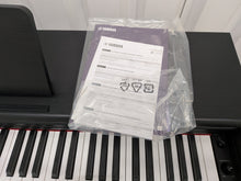 Load image into Gallery viewer, Yamaha Arius YDP-145 digital piano in satin black finish stock #25430