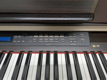 Load image into Gallery viewer, Yamaha Clavinova CLP-970 Digital Piano and stool in rosewood stock nr 25451