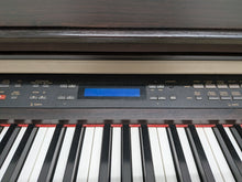 Load image into Gallery viewer, Yamaha Clavinova CLP-970 Digital Piano and stool in rosewood stock nr 25451