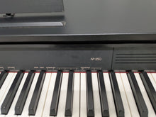 Load image into Gallery viewer, Casio Celviano AP-250 digital piano and stool in satin black finish stock number 25446