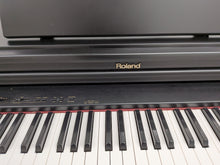 Load image into Gallery viewer, Roland HP237e Digital Piano in satin black finish Stock nr 25459