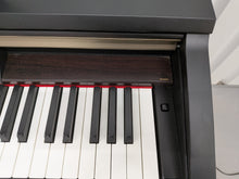 Load image into Gallery viewer, Yamaha Clavinova CLP-130 Digital Piano and stool in black stock #25457
