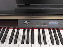 Load image into Gallery viewer, Yamaha Clavinova CLP-130 Digital Piano and stool in black stock #25457