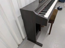Load image into Gallery viewer, Roland RP201 Digital Piano and stool in dark rosewood finish Stock #25481