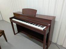 Load image into Gallery viewer, Yamaha Clavinova CLP-535 in mahogany with matching stool stock nr 25486