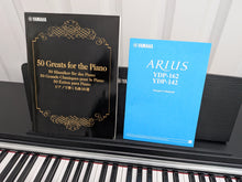 Load image into Gallery viewer, Yamaha Arius YDP-142 Digital Piano and stool in satin black stock #25522