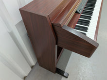 Load image into Gallery viewer, Yamaha Clavinova CLP-240 Digital Piano in mahogany stock nr 25514