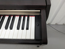 Load image into Gallery viewer, Yamaha Clavinova CLP-220 digital piano in dark rosewood stock #25526
