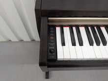 Load image into Gallery viewer, Yamaha Clavinova CLP-220 digital piano in dark rosewood stock #25526
