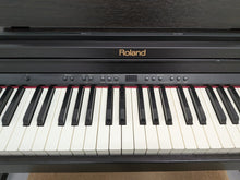 Load image into Gallery viewer, Roland RP401R digital piano and stool in dark rosewood finish stock number 25544