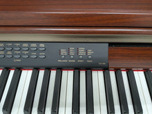 Load image into Gallery viewer, Yamaha Clavinova CLP-230 digital piano and stool in mahogany stock #25551