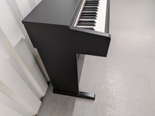 Load image into Gallery viewer, Yamaha Arius YDP-142 Digital Piano in satin black stock #25558