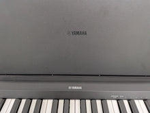 Load image into Gallery viewer, Yamaha P145 Digital Piano and full wooden stand, Black stock #25573