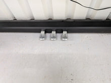 Load image into Gallery viewer, Roland F130R Digital Piano in black with matching colour stool stock # 25570