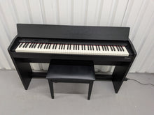 Load image into Gallery viewer, Roland F140R Digital Piano in satin black slim line space saver stock # 26052